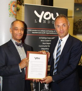 Kenneth Olisa OBE presents YOU London pledge to Dominic Cotton